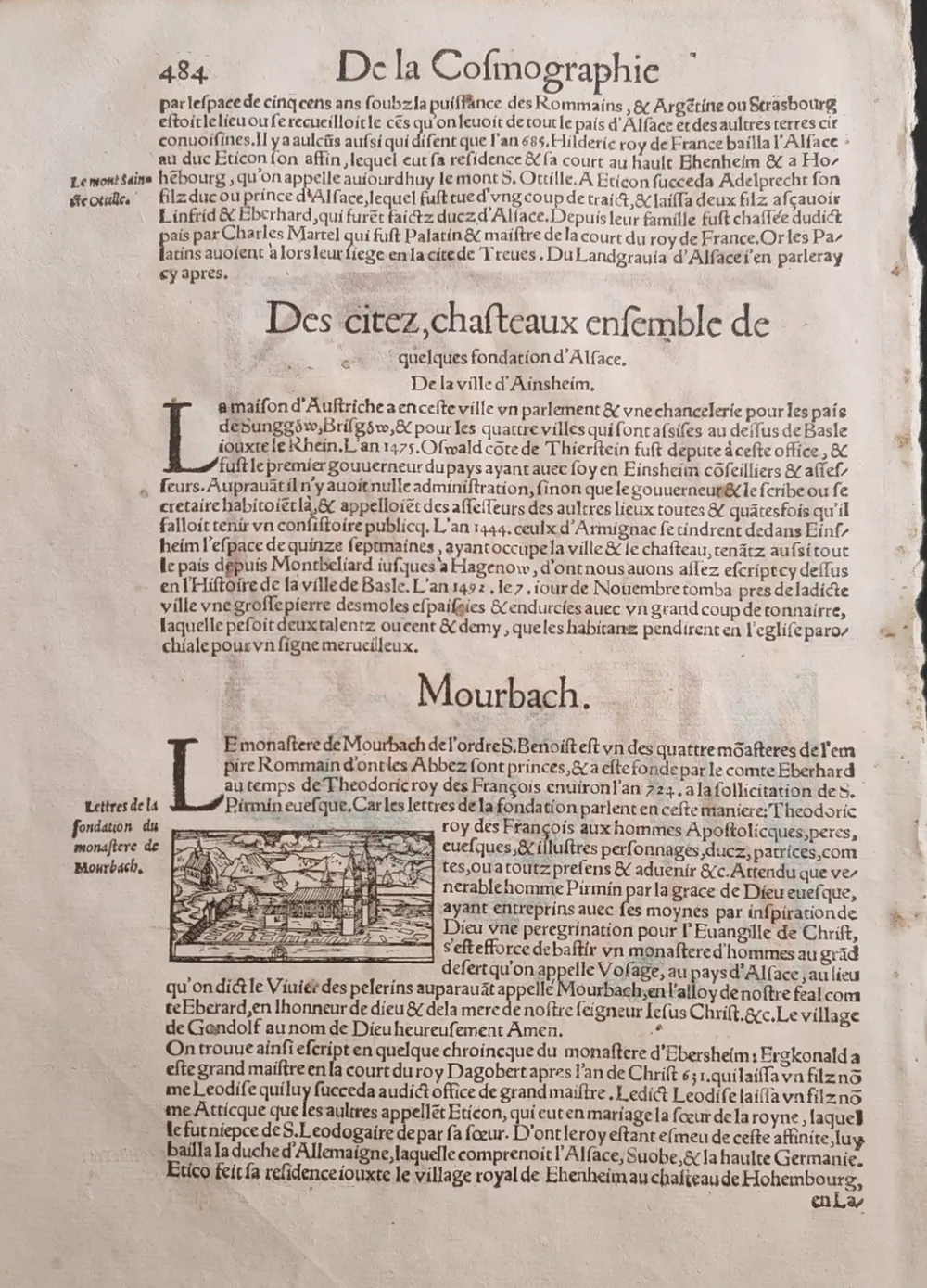 Sebastian Münster, La Cosmographie universelle, Bâle, 1552, livre III, p. 484 : la notice « Mourbach », sa vignette gravée et la teneur des lettres de fondation.